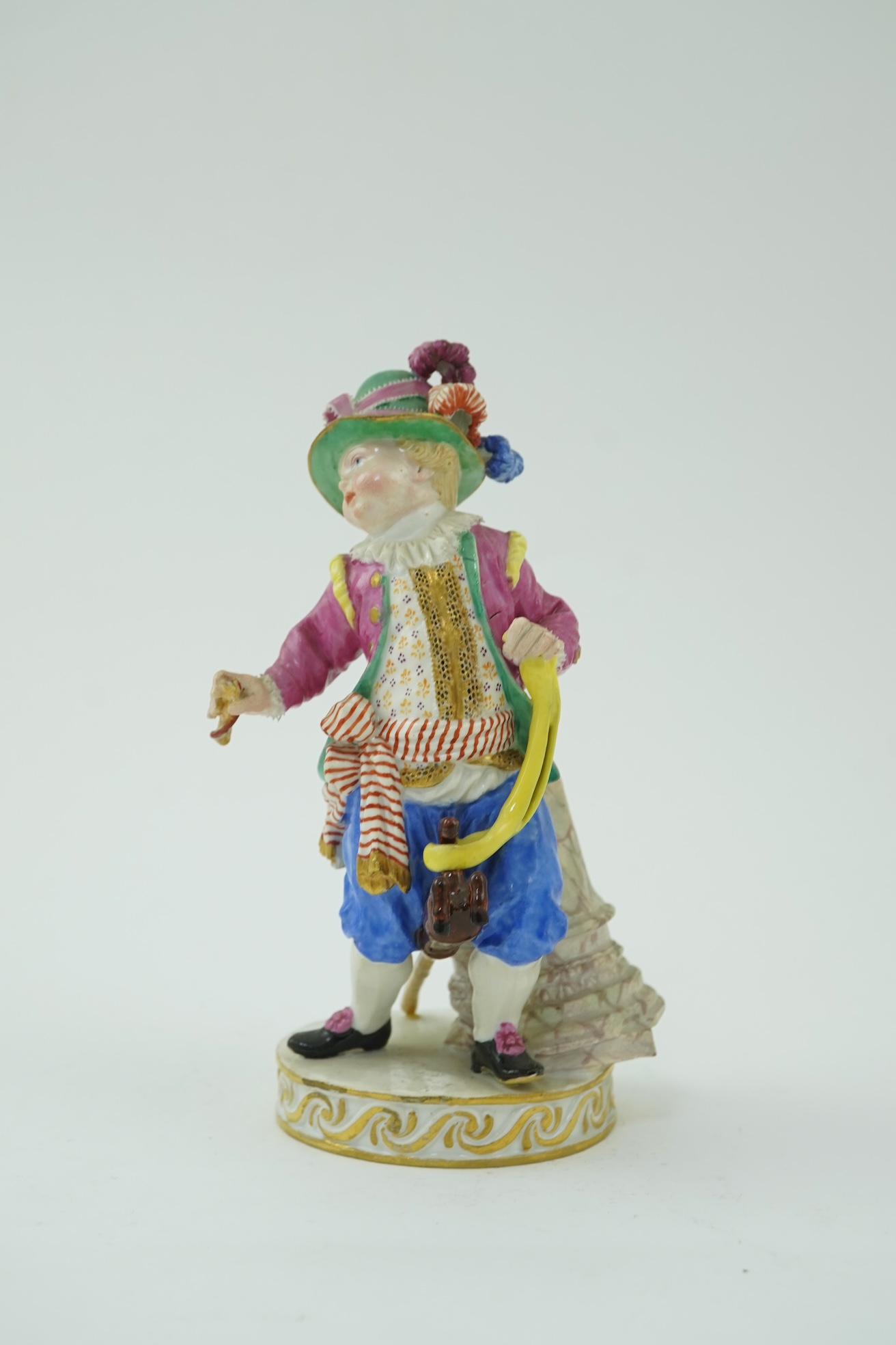 A Meissen figure of a boy on a hobby horse, 19th century